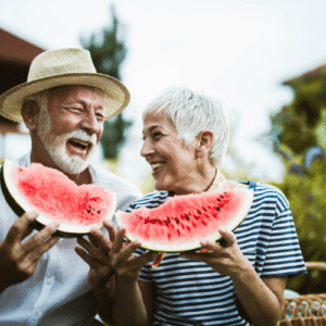 Couple eating watermelon